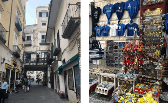 típicas ruas de Amalfi Costa Amalfitana: casas em rua de Amalfi e produtos diversos a venda