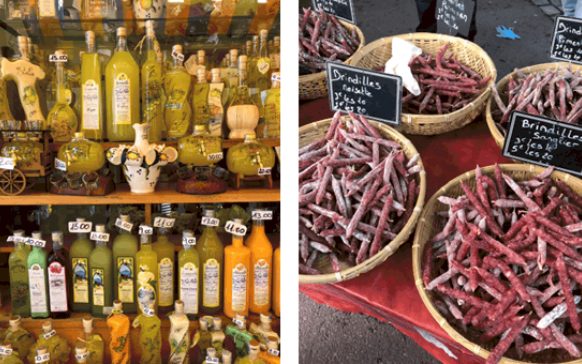 Especiarias em Sorrento Costa Amalfitana: Garrafas de Limoncello e temperos em cestas